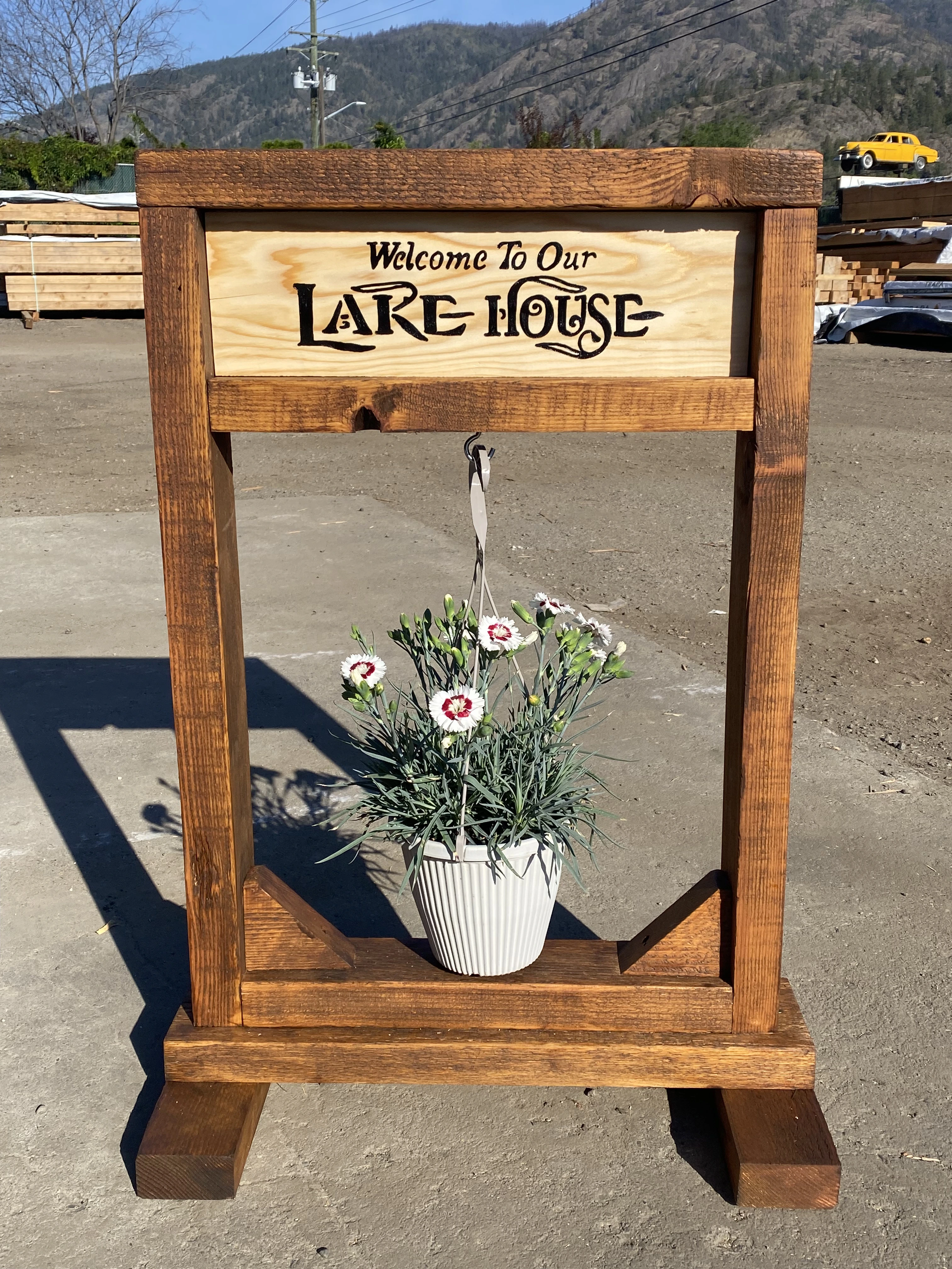 Custom carved Welcome To Our Lake House decorative sign
