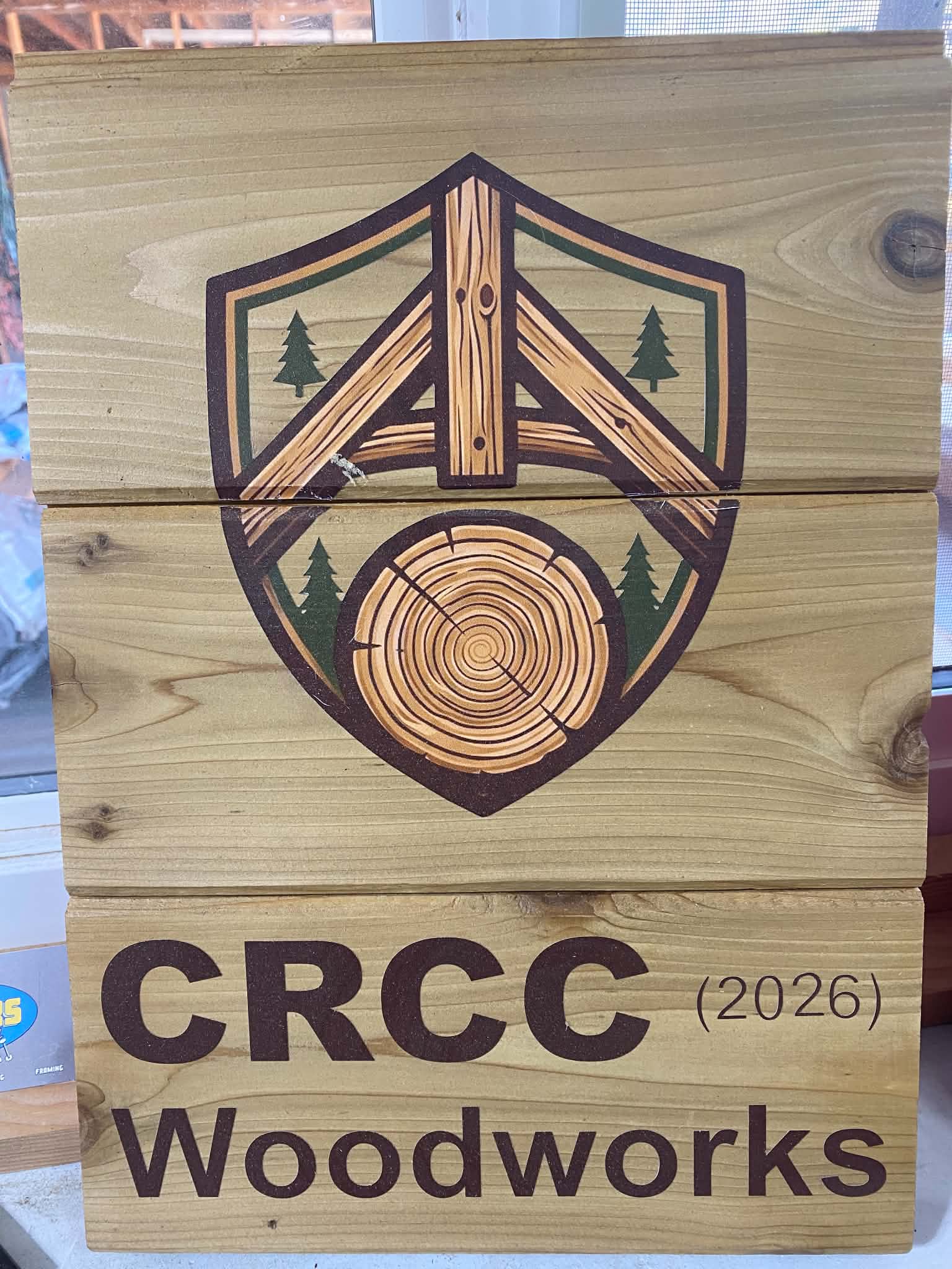 CRCC Woodworks yard and sign